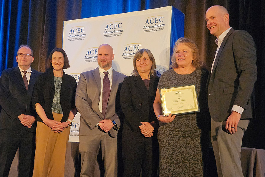 Henry K Oliver school project team accepting Gold Medal from ACEC/MA